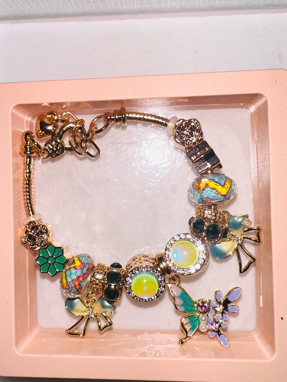 Gold Multicolor Charm Bracelet with Green and Gold Accents